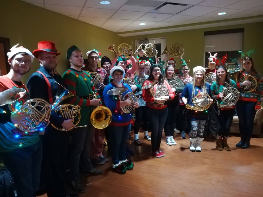 The WVU Horn Ensemble caroling for patients at the Rosenbaum Family House in Morgantown, WV.