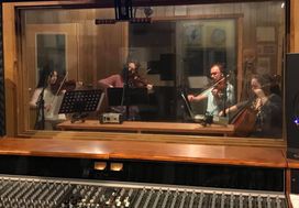 Violin students recording in the music studio